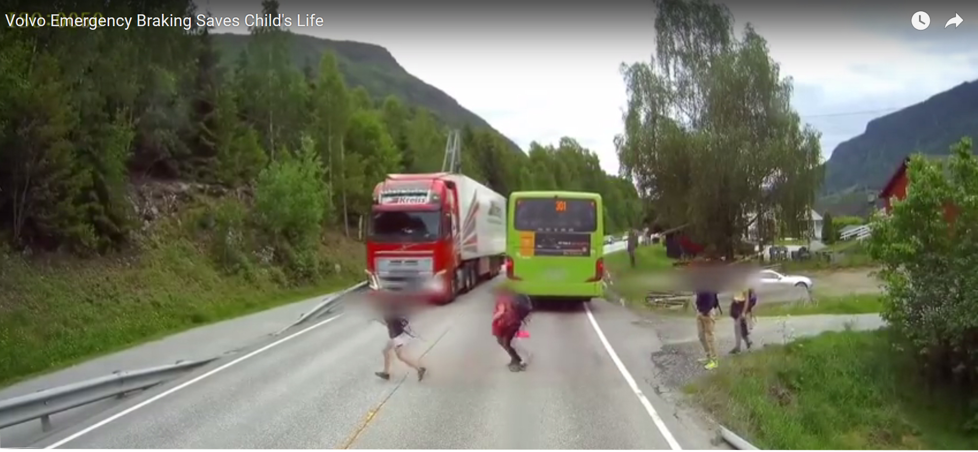 Dashcam captures truck's near-miss with children crossing highway