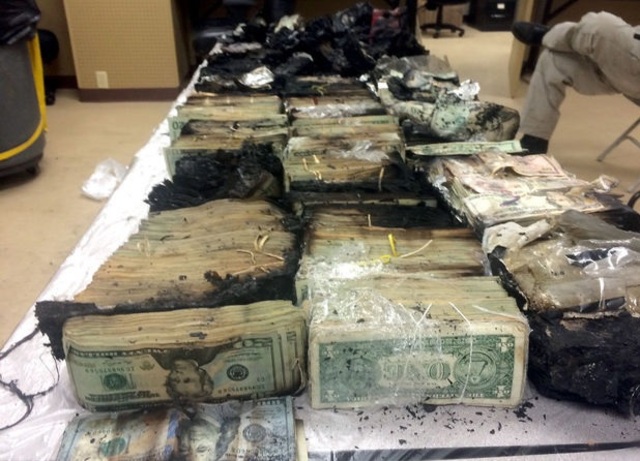 Trucker Killed , $1M in Cash Burns In Trailer Fire